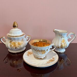 Unbrended Set of White and Gold Cup Saucer Sugar Bowl and Creamer